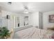 Bright bedroom features hardwood floors, white paint, and natural light at 111 Beacon Hills Dr, Gastonia, NC 28056