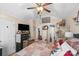 Bedroom featuring ceiling fan, neutral paint, ensuite bathroom, and ample closet space at 111 Beacon Hills Dr, Gastonia, NC 28056