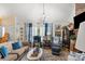 Cozy living room features stylish decor, comfortable seating, and abundant natural light, creating a welcoming ambiance at 111 Beacon Hills Dr, Gastonia, NC 28056