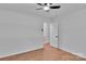 Bedroom featuring hardwood floors, a ceiling fan, and an open entry to another room at 113 Lou Dr, Gastonia, NC 28052