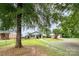 Home exterior with a large lot, driveway, and separate garage at 1145 Earl Rd, Shelby, NC 28152