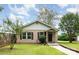 Charming bungalow-style home featuring a quaint front porch and well-maintained lawn at 1145 Earl Rd, Shelby, NC 28152