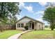 Charming bungalow-style home featuring a quaint front porch and well-maintained lawn at 1145 Earl Rd, Shelby, NC 28152
