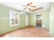 View of the living room featuring an AC unit, hardwood floors, and an open layout at 1145 Earl Rd, Shelby, NC 28152