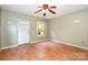 Spacious living room featuring hardwood floors, front door, and natural light at 1145 Earl Rd, Shelby, NC 28152