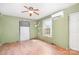 View of the living room, featuring hardwood floors, natural light, and AC Unit at 1145 Earl Rd, Shelby, NC 28152