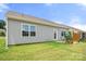 A spacious backyard with a patio, privacy screen, and gray exterior at 125 White Apple Way, Statesville, NC 28625