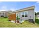 Backyard patio featuring a privacy screen, outdoor furniture, and a gray exterior at 125 White Apple Way, Statesville, NC 28625