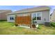 Charming patio features a privacy screen, creating a secluded and inviting outdoor space at 125 White Apple Way, Statesville, NC 28625