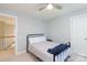 Neutral bedroom with a metal frame bed and a view to the stairway at 1587 Summit View Dr, Rock Hill, SC 29732