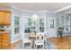Cozy dining area featuring a round table, chandelier, and lots of natural light at 1587 Summit View Dr, Rock Hill, SC 29732