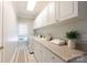 Clean laundry room featuring ample counter space and overhead cabinets at 1587 Summit View Dr, Rock Hill, SC 29732