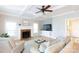 Comfortable living room with fireplace and a ceiling fan, offering a relaxing atmosphere at 1587 Summit View Dr, Rock Hill, SC 29732