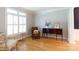 Bright living room featuring hardwood floors, a bay window with shutters, and classic furnishings at 1587 Summit View Dr, Rock Hill, SC 29732
