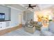 Open-concept living room connecting to the kitchen and dining area with a coffered ceiling at 1587 Summit View Dr, Rock Hill, SC 29732