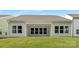 Charming home featuring a backyard with a covered patio and ceiling fans, ideal for outdoor enjoyment at 170 Aspire Cir # 31, Wingate, NC 28174