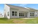 Spacious backyard with a covered patio, perfect for outdoor relaxation and entertaining guests at 170 Aspire Cir # 31, Wingate, NC 28174