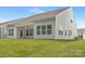 Picturesque backyard with a covered patio, offering a serene and private outdoor space for leisure at 170 Aspire Cir # 31, Wingate, NC 28174