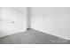 Bright bedroom features neutral carpet and paint for a clean, modern aesthetic at 170 Aspire Cir # 31, Wingate, NC 28174