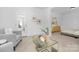 Cozy living room with neutral tones, a glass coffee table, and soft textures at 170 Aspire Cir # 31, Wingate, NC 28174