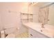 Bright bathroom features a large mirror, vanity with storage, and a clean, well-lit space at 2008 Bantry Ln, Charlotte, NC 28262