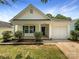 Charming single-story home with a well-manicured lawn and inviting front porch at 2010 Kansas City Dr, Monroe, NC 28110