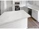 Bright kitchen with an island, stainless steel appliances, and ample counter space at 2010 Kansas City Dr, Monroe, NC 28110