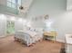 Bright bedroom with a ceiling fan, white trim, carpeted floor, and quilt-covered bed at 2032 Greenbrook Pkwy, Matthews, NC 28104