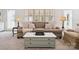 Bright and airy living room with shuttered windows, comfortable seating, and neutral tones creating a cozy ambiance at 2032 Greenbrook Pkwy, Matthews, NC 28104