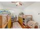 Cozy ' bedroom featuring playful bunk beds, hardwood floors, and a bright, inviting atmosphere at 2034 Lanier Ave, Charlotte, NC 28205