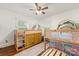 Fun bedroom featuring wooden bunk beds with storage and decor at 2034 Lanier Ave, Charlotte, NC 28205