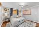 Comfortable bedroom featuring neutral tones, wood floors, and ambient natural light at 2034 Lanier Ave, Charlotte, NC 28205