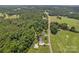 Serene aerial view of a property with a house, pool, and surrounding landscape at 247 Helton Rd, Cherryville, NC 28021