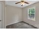 Neutral bedroom with a large window overlooking a backyard deck at 247 Helton Rd, Cherryville, NC 28021