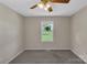 Neutral bedroom with a large window overlooking a green lawn at 247 Helton Rd, Cherryville, NC 28021
