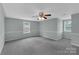 Spacious bonus room with a ceiling fan and plenty of natural light at 247 Helton Rd, Cherryville, NC 28021