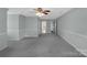 Spacious bonus room with a ceiling fan, chair rail and doorways to other rooms at 247 Helton Rd, Cherryville, NC 28021