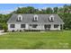 Charming single-story home with a welcoming front porch and well-manicured lawn at 247 Helton Rd, Cherryville, NC 28021