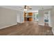 Open-concept living area with natural light, hardwood floors, and access to the kitchen and backyard at 247 Helton Rd, Cherryville, NC 28021