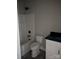 Modern bathroom featuring a combination tub and shower, sleek fixtures, and contemporary white vanity at 2560 S Jake Alexander S Blvd, Salisbury, NC 28146