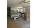Bright kitchen boasts white cabinets, dark countertops, stainless appliances, and modern lighting fixtures at 2560 S Jake Alexander S Blvd, Salisbury, NC 28146