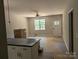 Open-concept living area filled with natural light, featuring modern finishes and neutral tones for versatile decorating at 2560 S Jake Alexander S Blvd, Salisbury, NC 28146