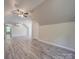 Spacious bonus room features vaulted ceilings, vinyl floors, and natural lighting at 292 Manchester Rd, Mount Gilead, NC 27306