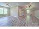 Spacious bonus room with large windows and modern ceiling fans at 292 Manchester Rd, Mount Gilead, NC 27306