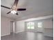 Open concept living space featuring vinyl floors, ceiling fan and natural light at 292 Manchester Rd, Mount Gilead, NC 27306