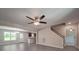 Spacious living room featuring an open floor plan with views of the dining area and modern kitchen at 292 Manchester Rd, Mount Gilead, NC 27306