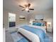 A beautifully decorated bedroom with soothing colors, plush bedding, and tasteful art at 292 Manchester Rd, Mount Gilead, NC 27306