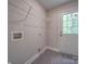 Mud room features a back door, storage, and easy access to the home's interior at 292 Manchester Rd, Mount Gilead, NC 27306