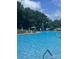 Enjoy the community pool with comfortable lounge seating and sun umbrellas at 292 Manchester Rd, Mount Gilead, NC 27306