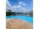 Enjoy the community pool with comfortable lounge seating and views of the lake at 292 Manchester Rd, Mount Gilead, NC 27306